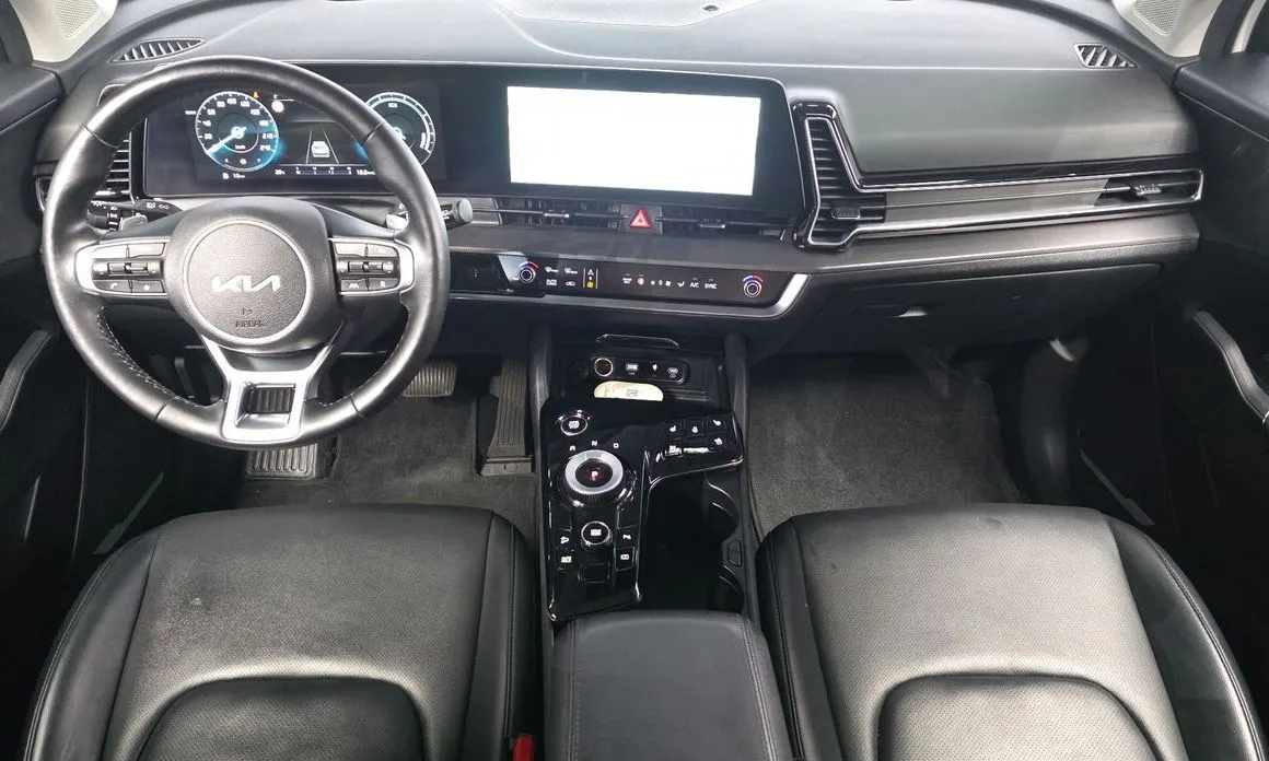 Kia Sportage — фото 8