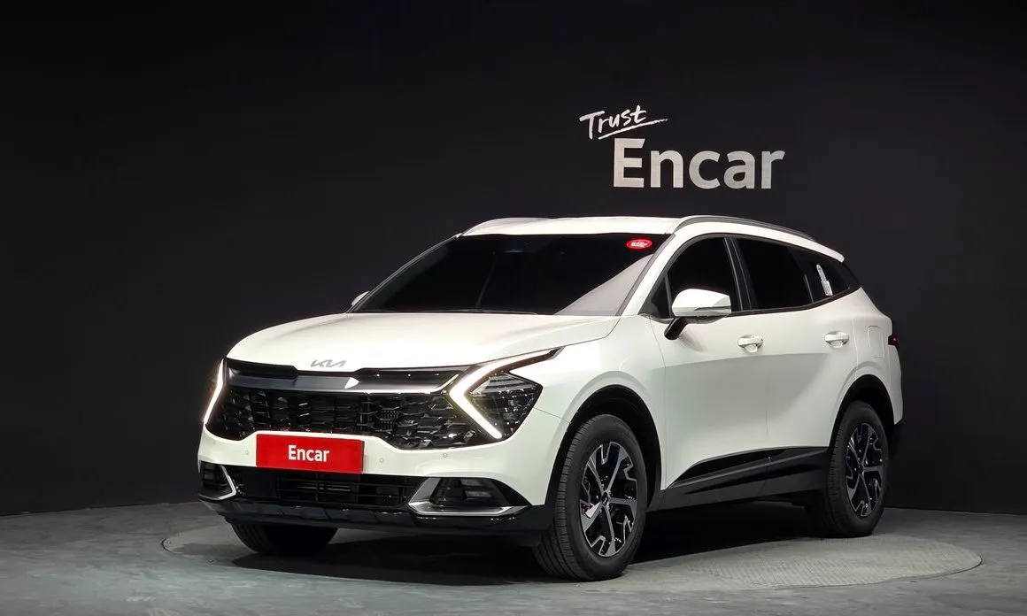 Kia Sportage — фото 1