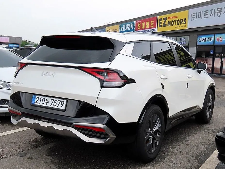 Kia Sportage — фото 10