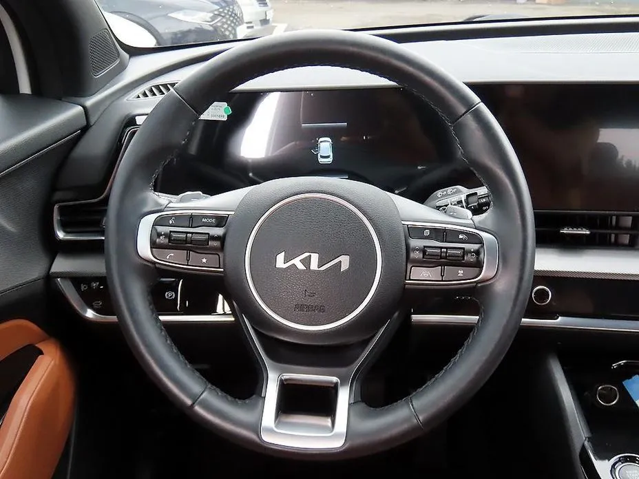 Kia Sportage — фото 7