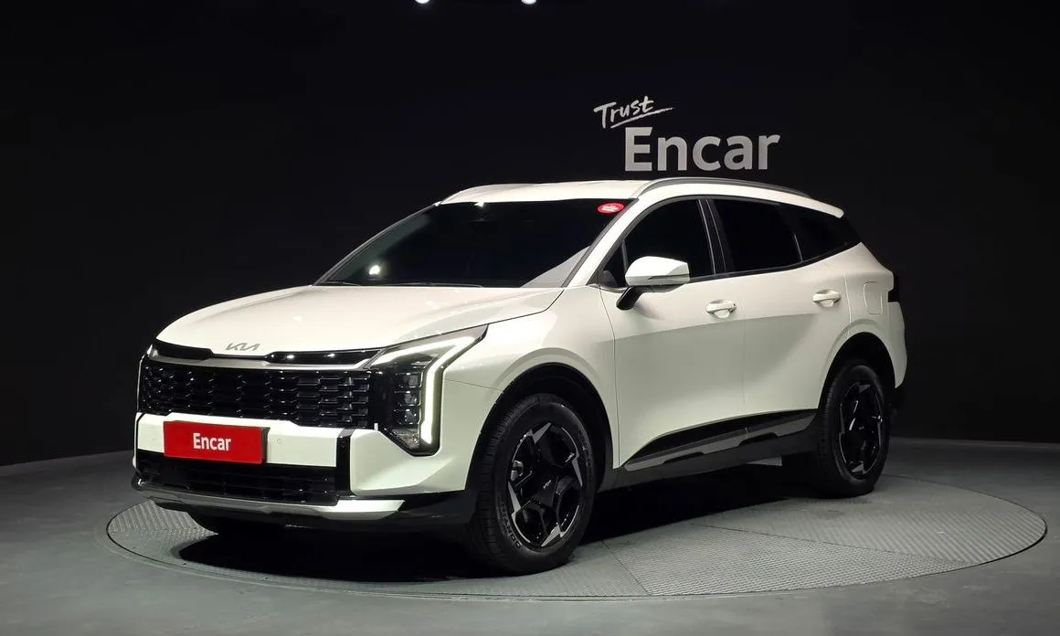 Kia Sportage — фото 1