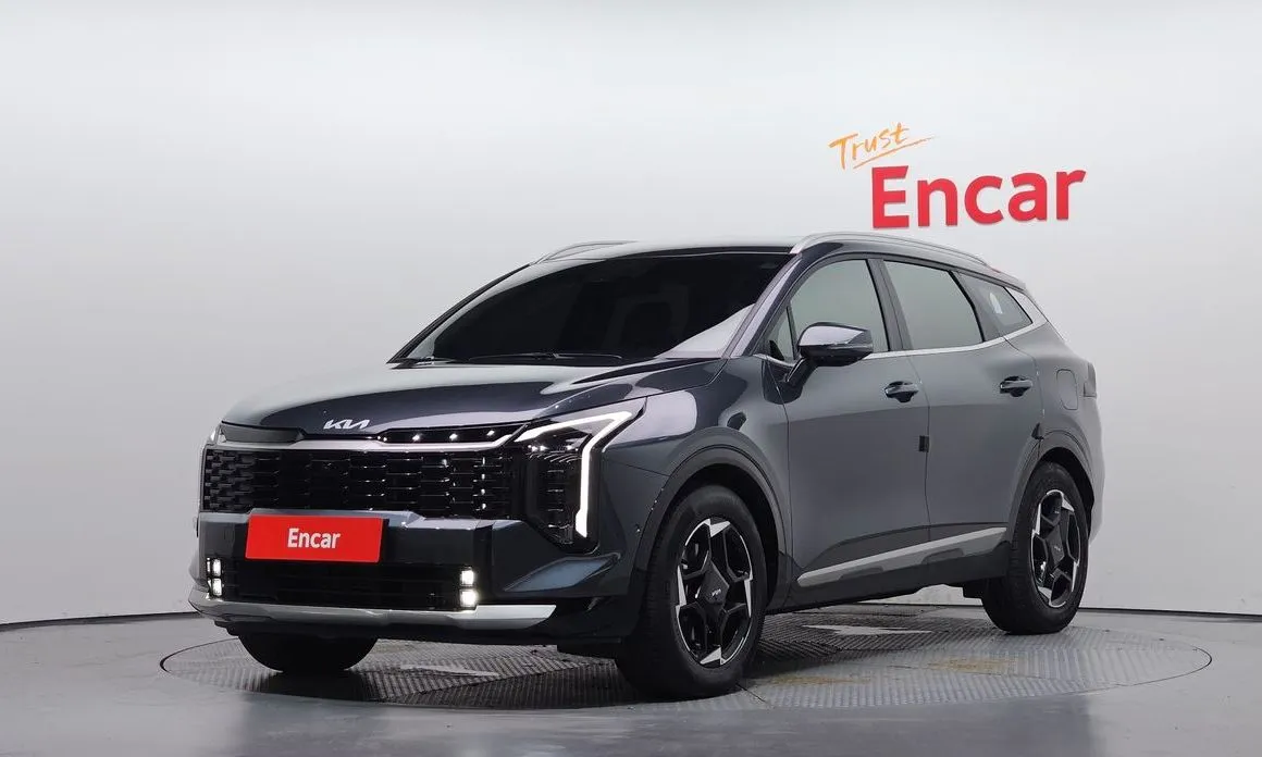 Kia Sportage — фото 1