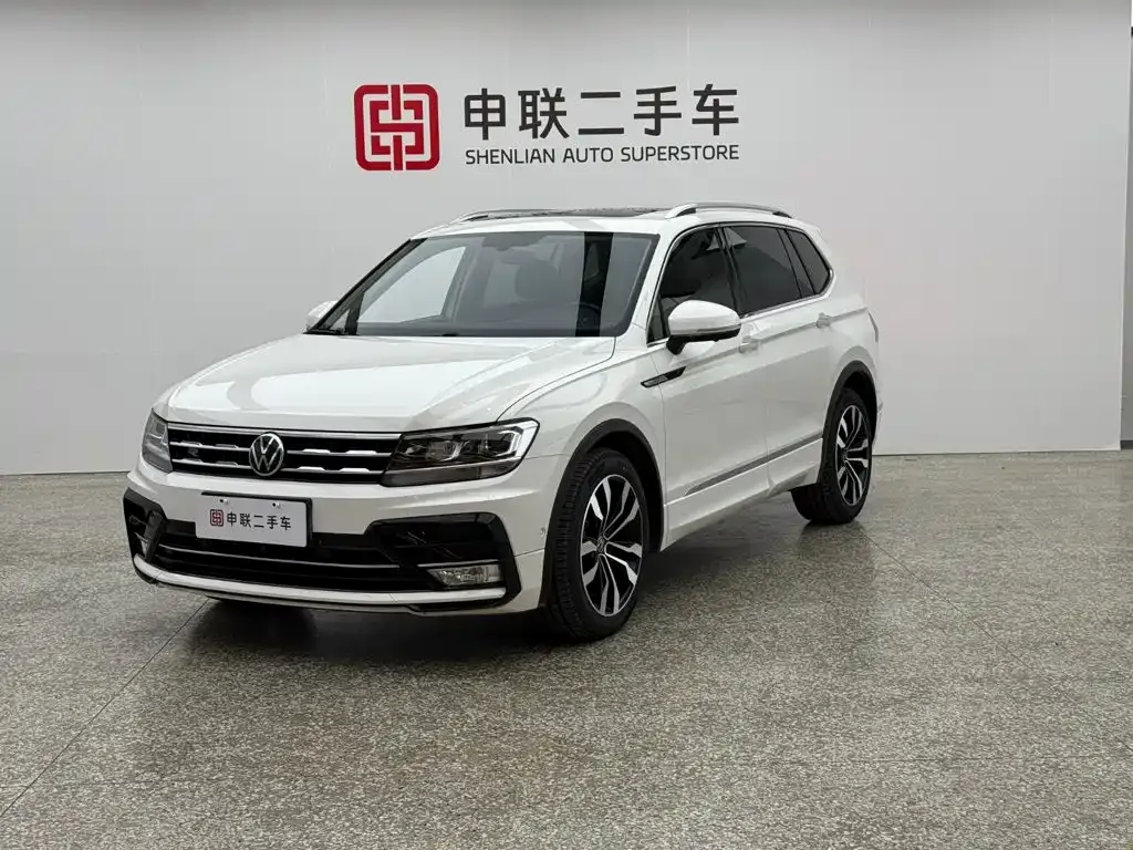 Volkswagen Tiguan L — фото 1