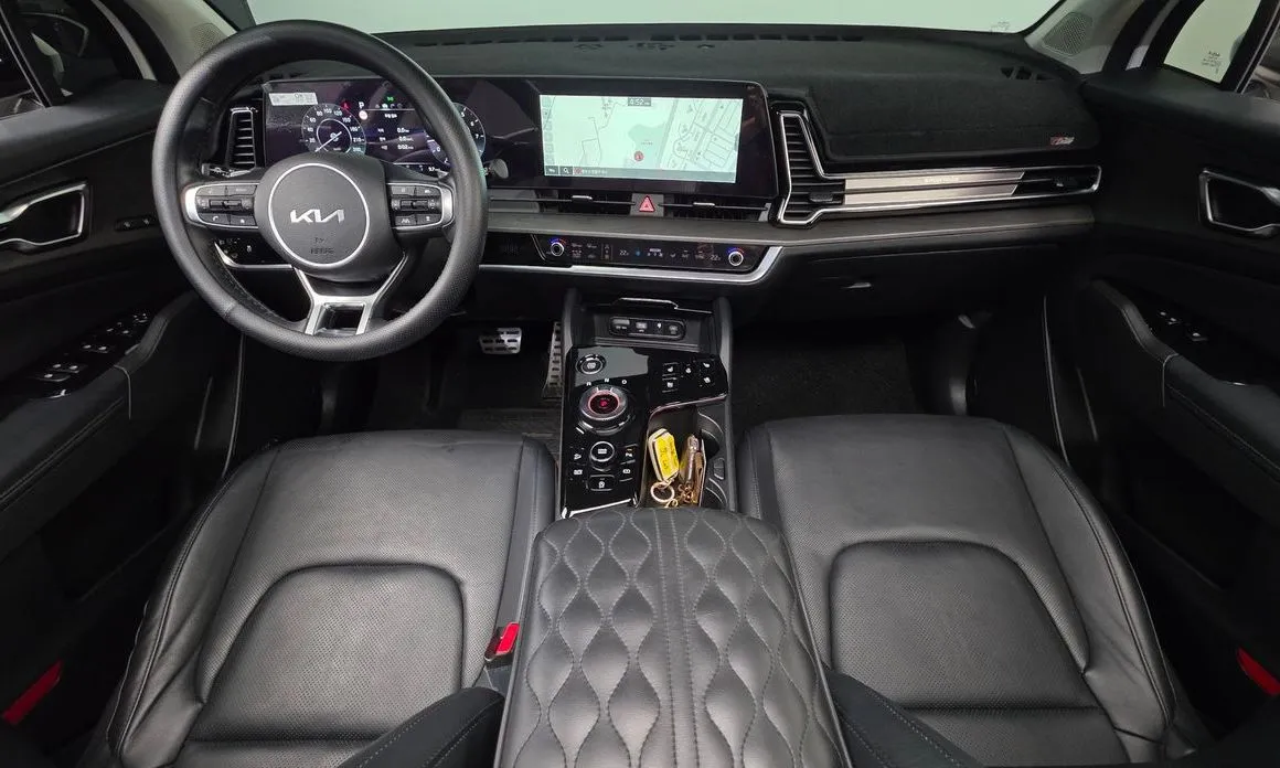 Kia Sportage — фото 7