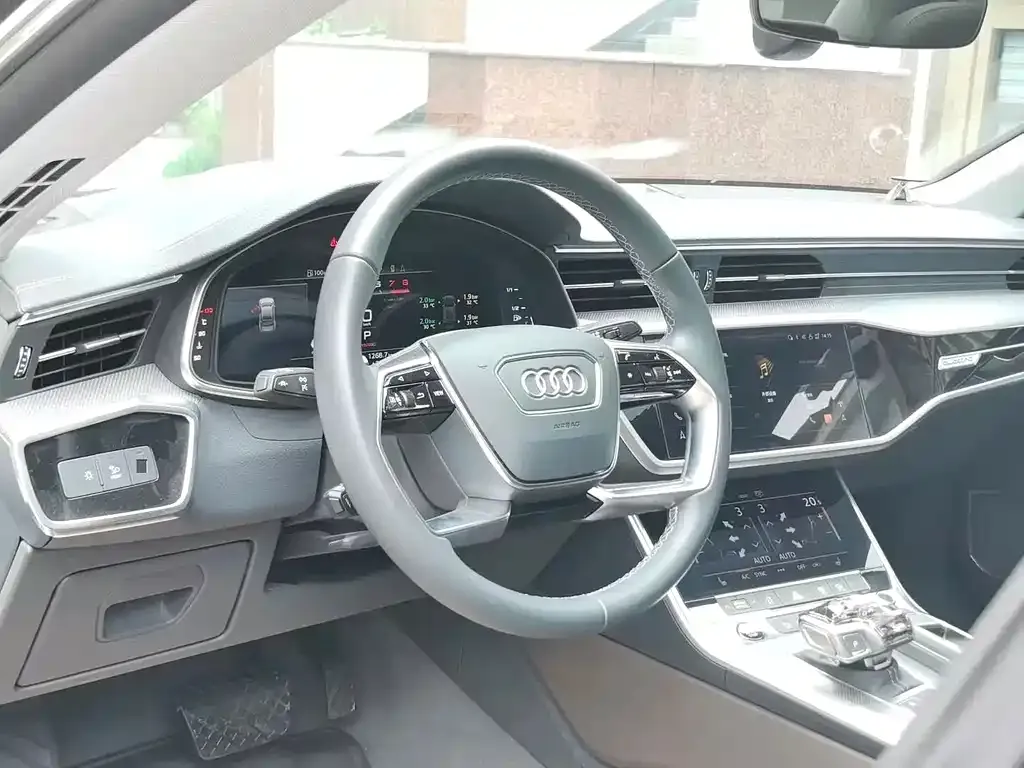 Audi A7L — фото 8
