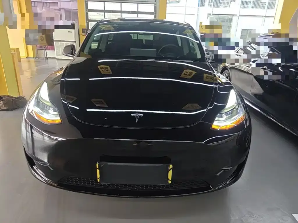 Tesla Model Y — фото 10