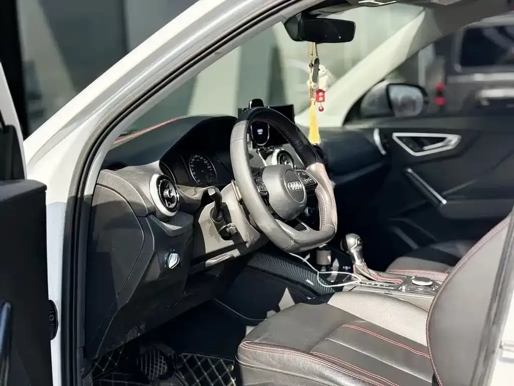 Audi Q2L 2023 из CN, фото 8