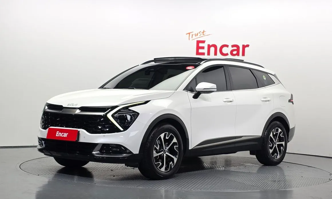 Kia Sportage — фото 1