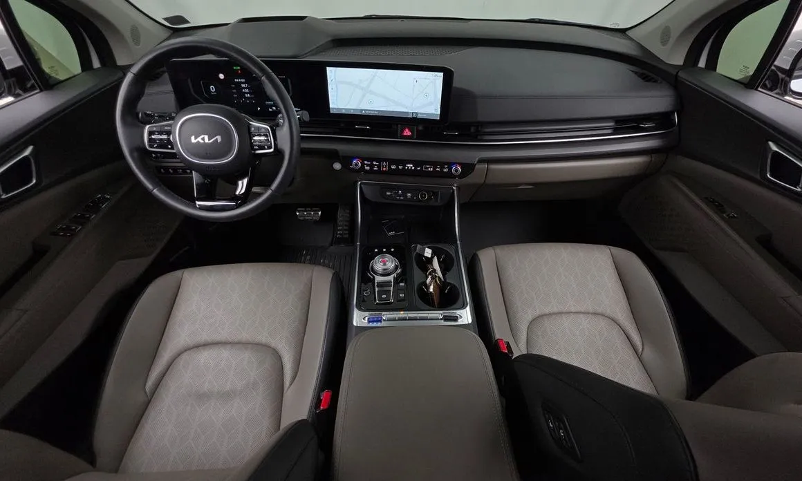 Kia Carnival — фото 10