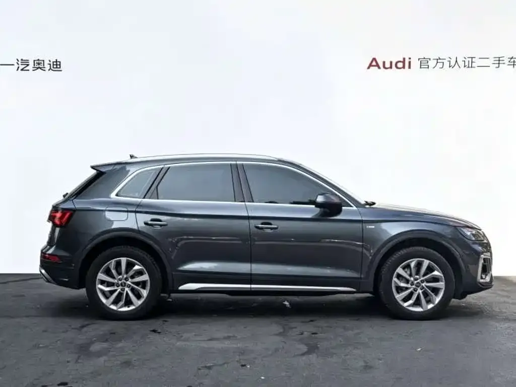 Audi Q5L — фото 9