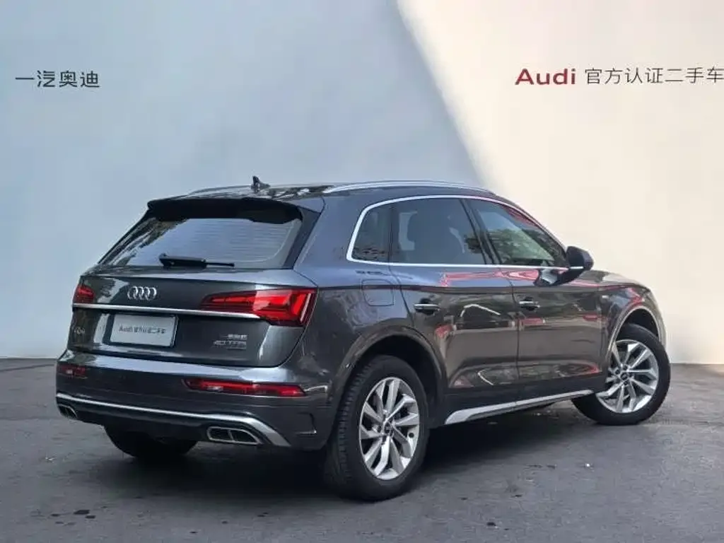 Audi Q5L — фото 10