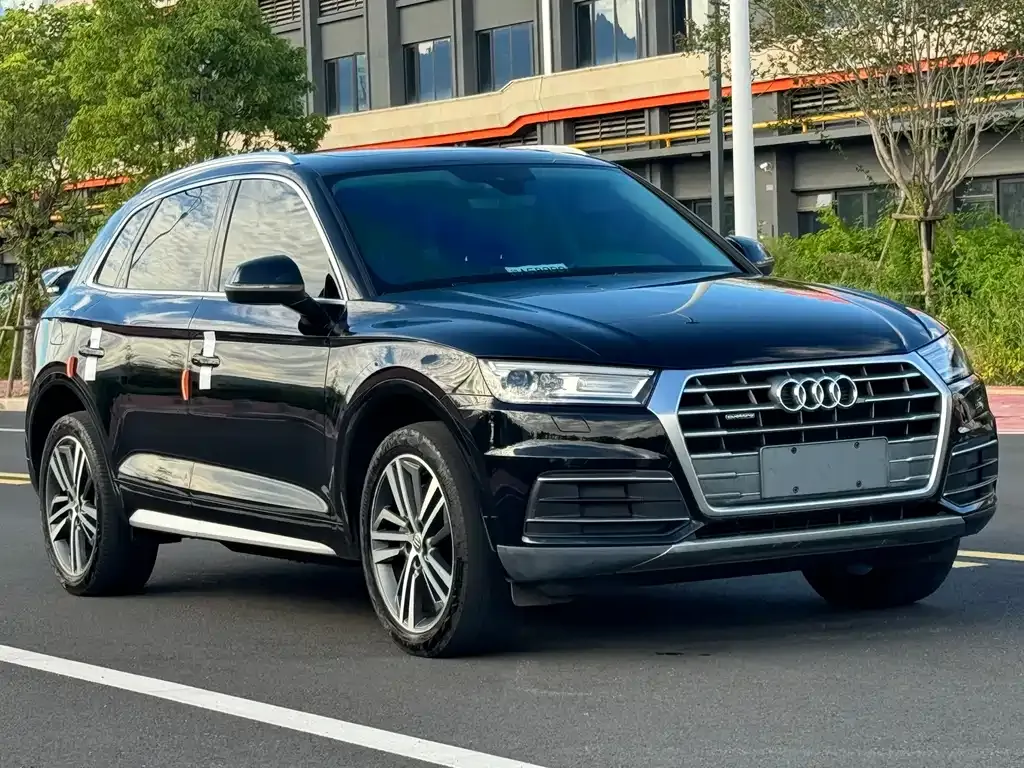 Audi Q5L — фото 7