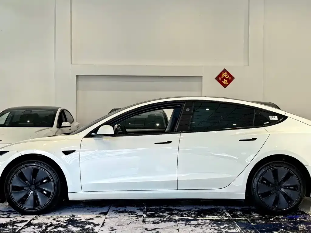 Tesla Model 3 — фото 6