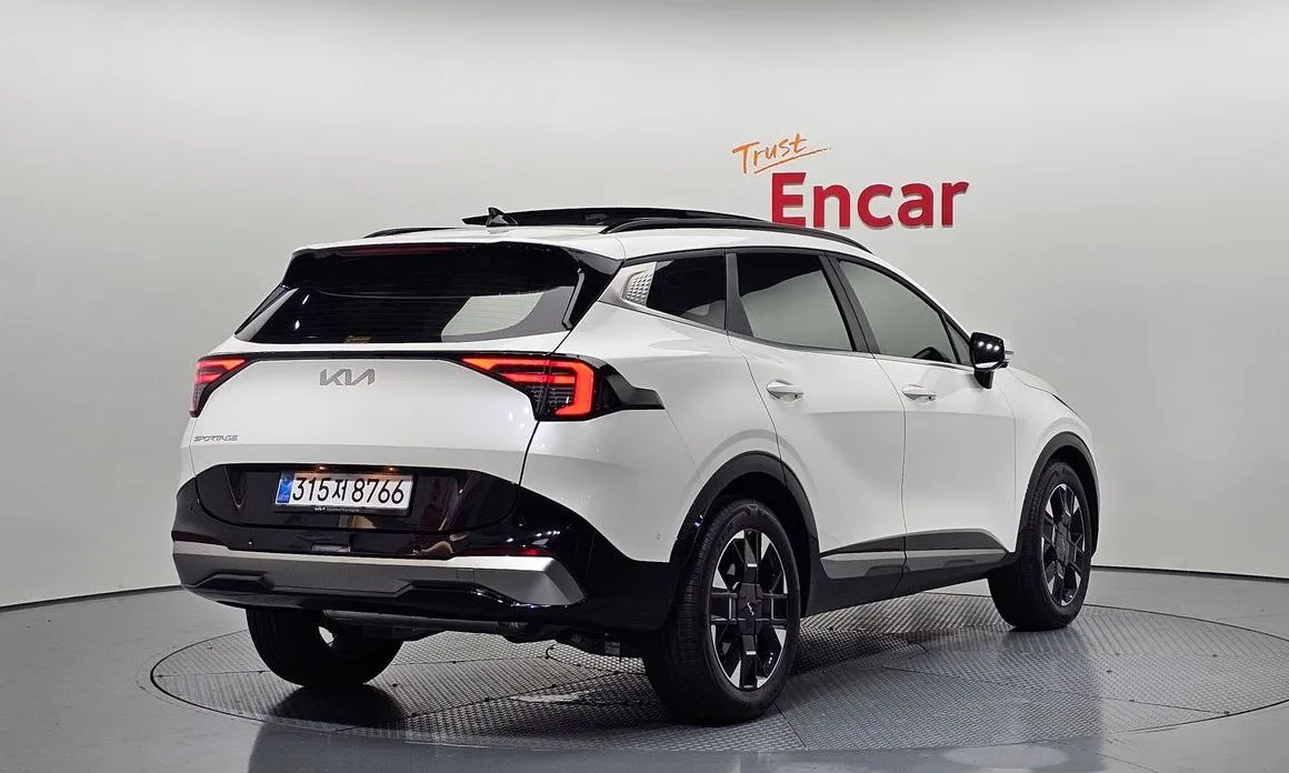 Kia Sportage — фото 7