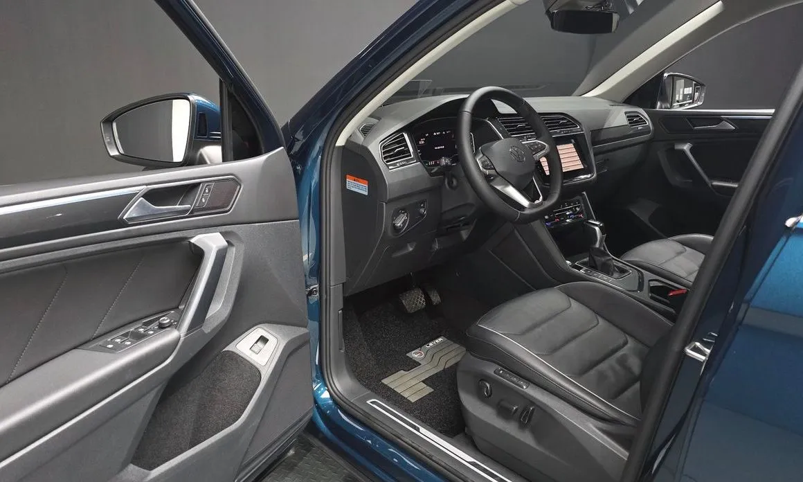 Volkswagen Tiguan — фото 8