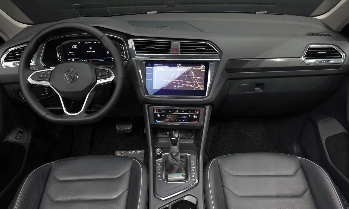 Volkswagen Tiguan — фото 9