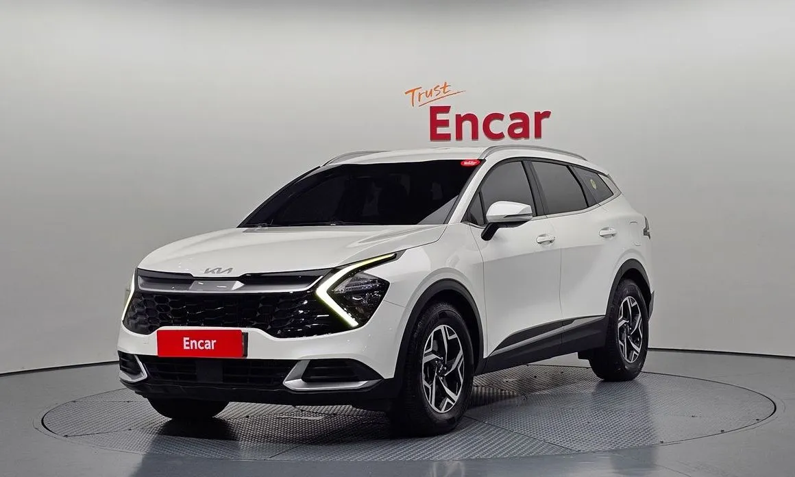 Kia Sportage — фото 1