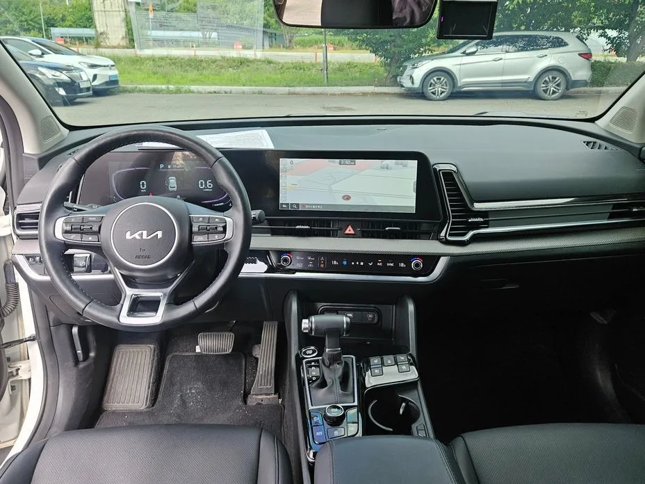Kia Sportage — фото 8