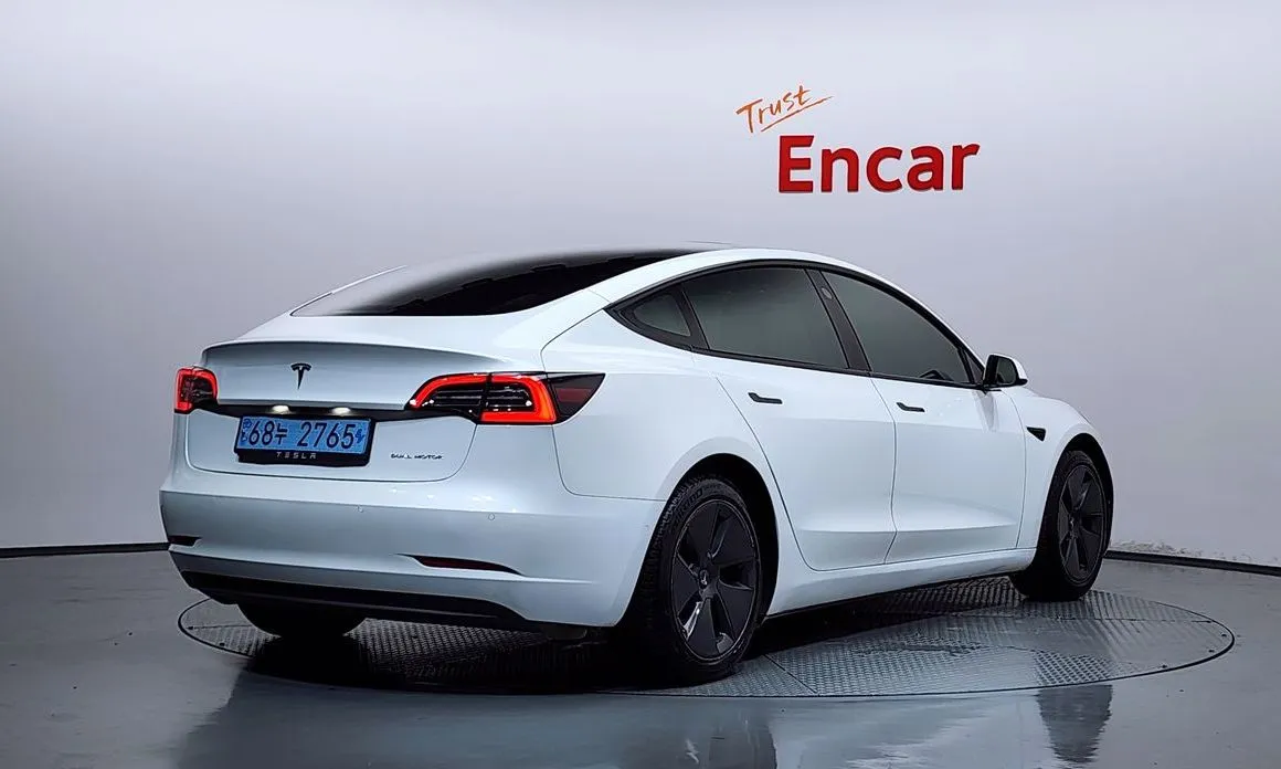 Tesla Model 3 — фото 7