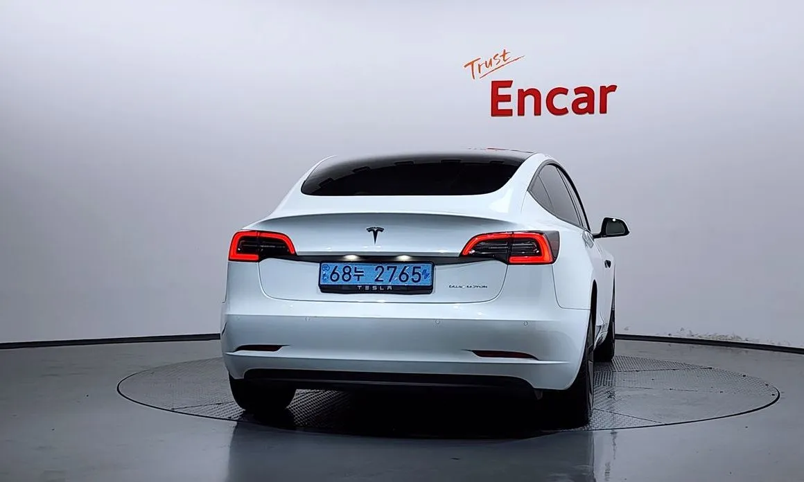 Tesla Model 3 — фото 6