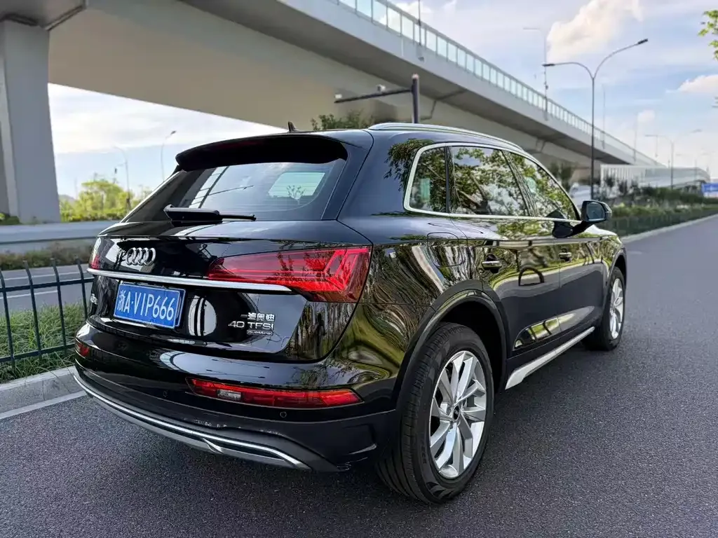Audi Q5L — фото 6