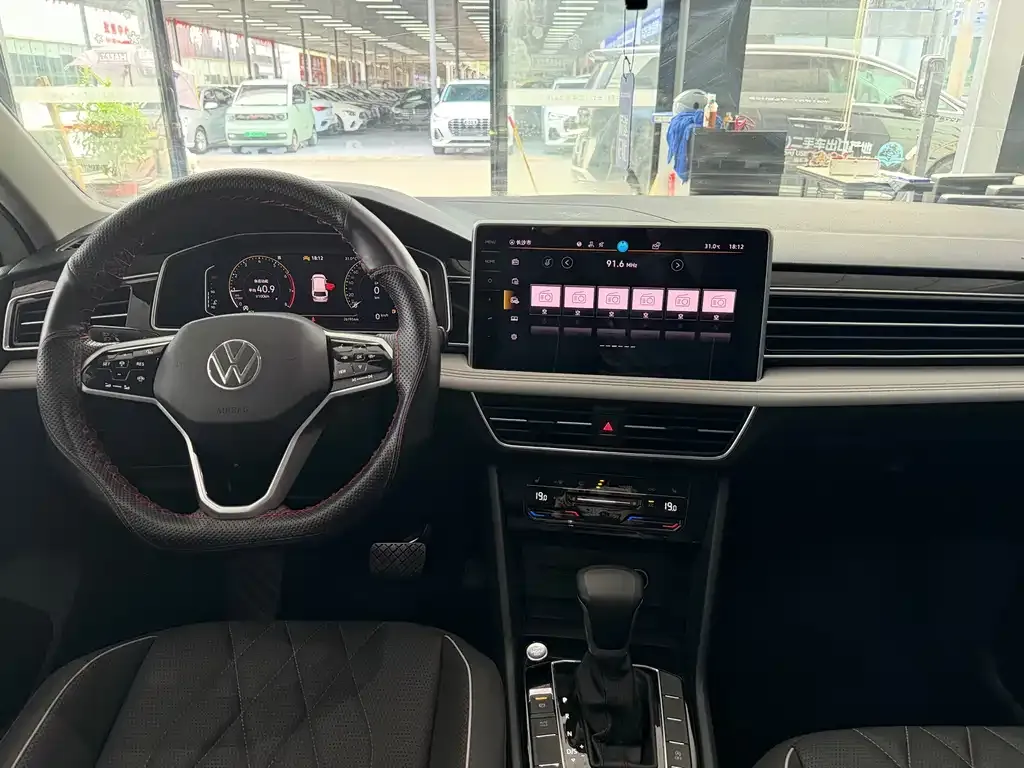Volkswagen Tiguan L — фото 4