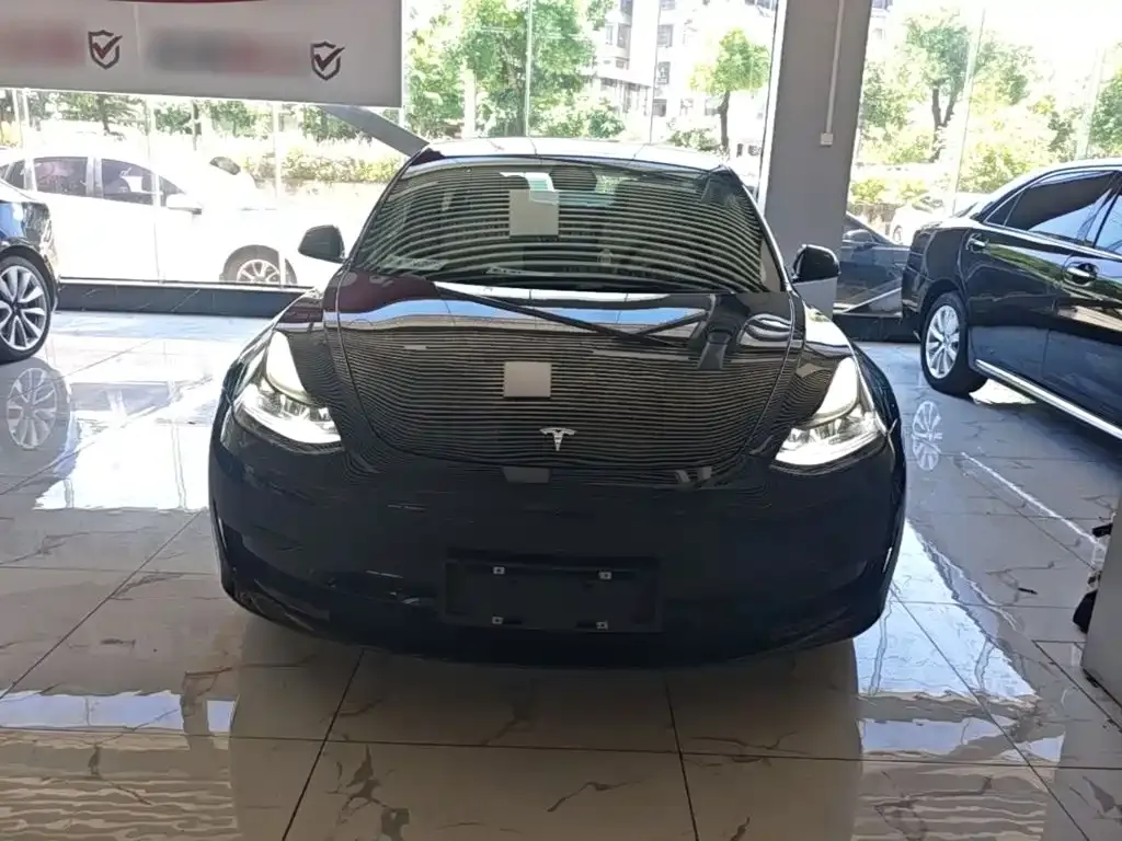 Tesla Model 3 — фото 7