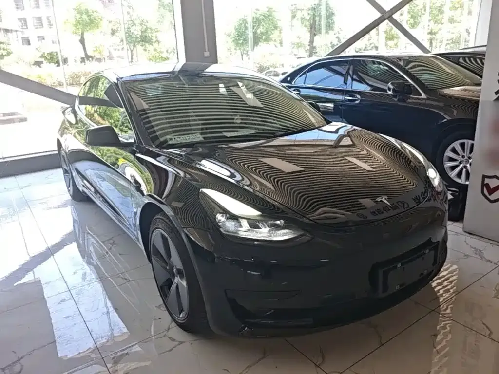 Tesla Model 3 — фото 9