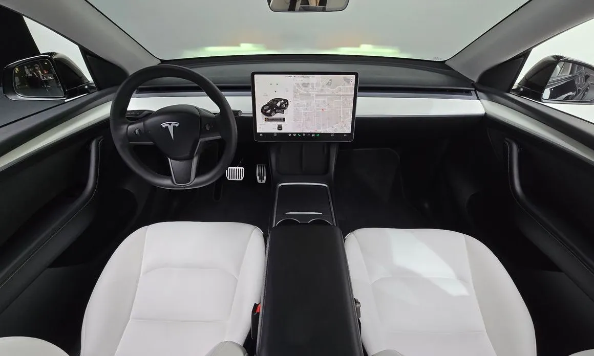 Tesla Model Y — фото 7