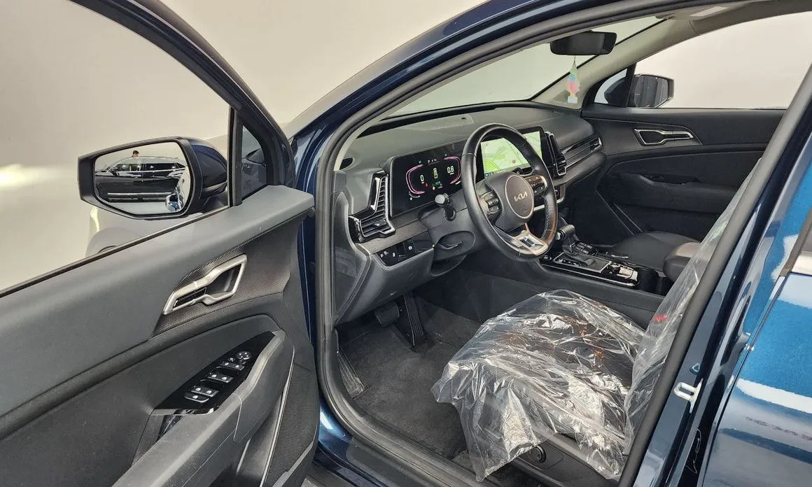 Kia Sportage — фото 9