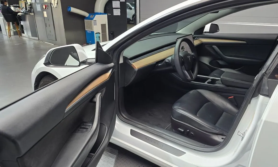 Tesla Model 3 — фото 10