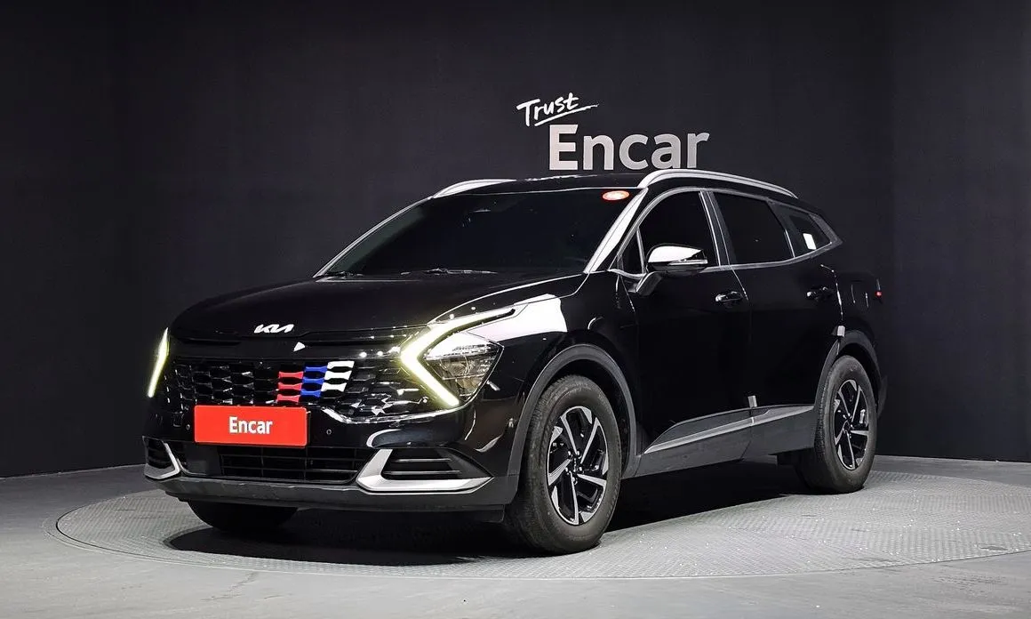 Kia Sportage — фото 1