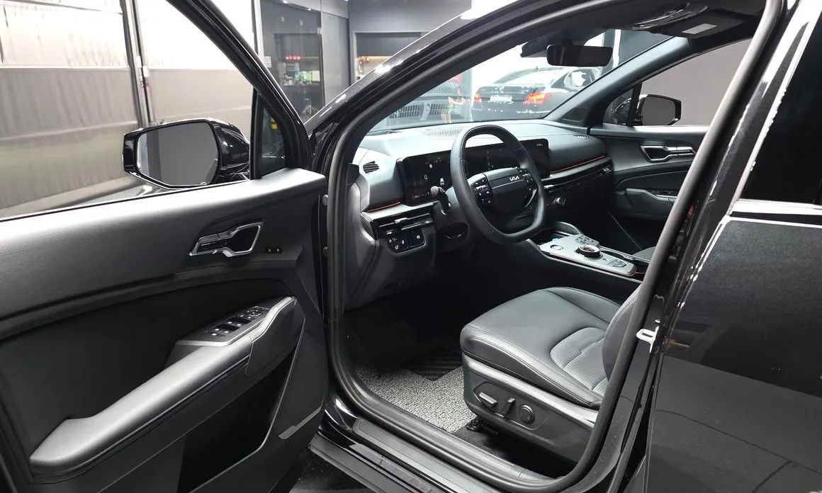 Kia Sportage — фото 10
