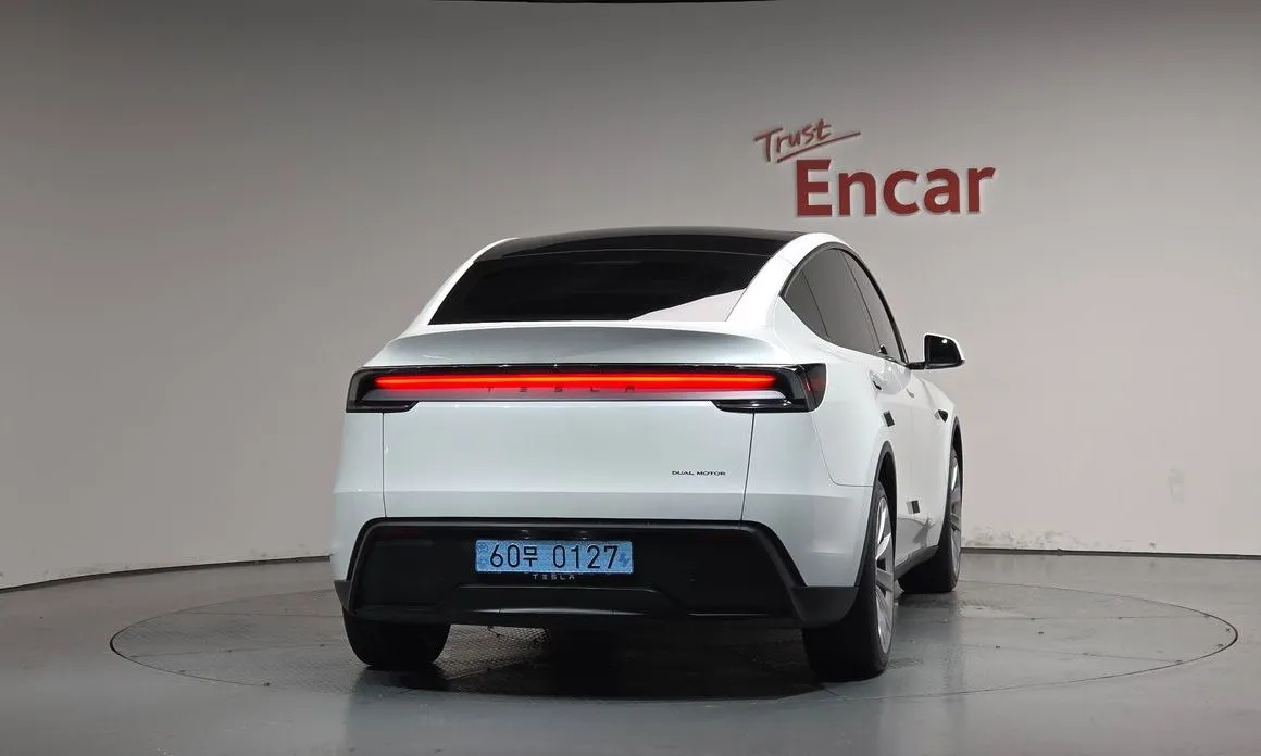 Tesla Model Y — фото 7