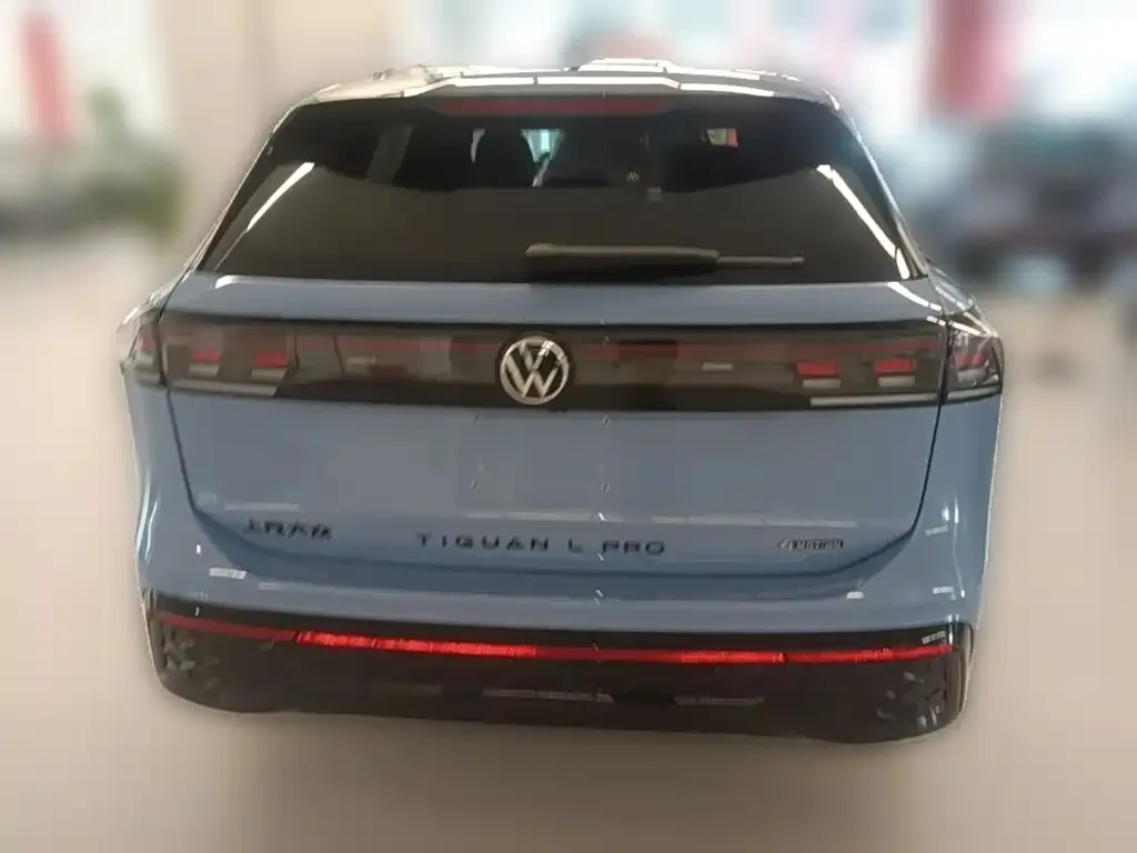 Volkswagen Tiguan L — фото 4