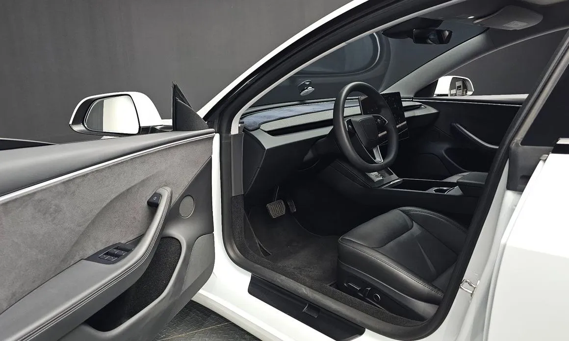 Tesla Model 3 — фото 10