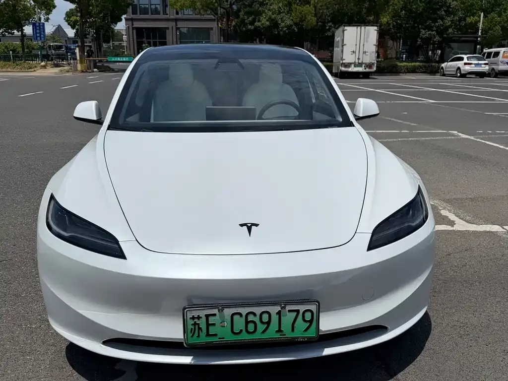 Tesla Model 3 — фото 7