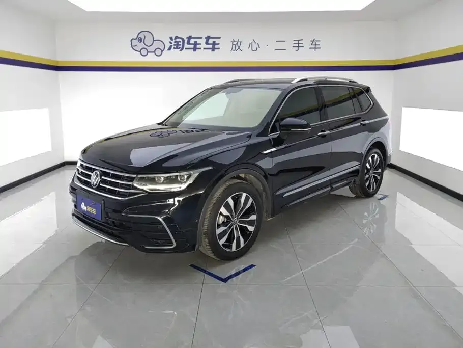 Volkswagen Tiguan L — фото 1