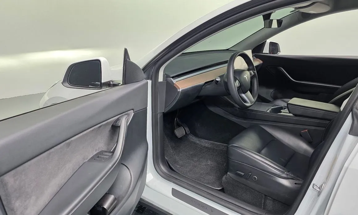 Tesla Model Y — фото 6