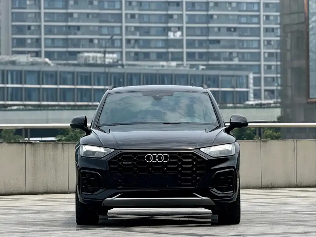 Audi Q5L — фото 10