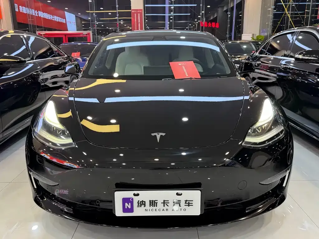 Tesla Model 3 — фото 8