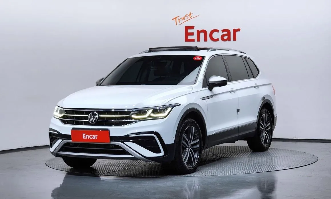 Volkswagen Tiguan — фото 1