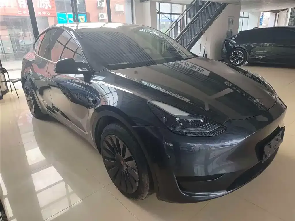 Tesla Model Y — фото 6