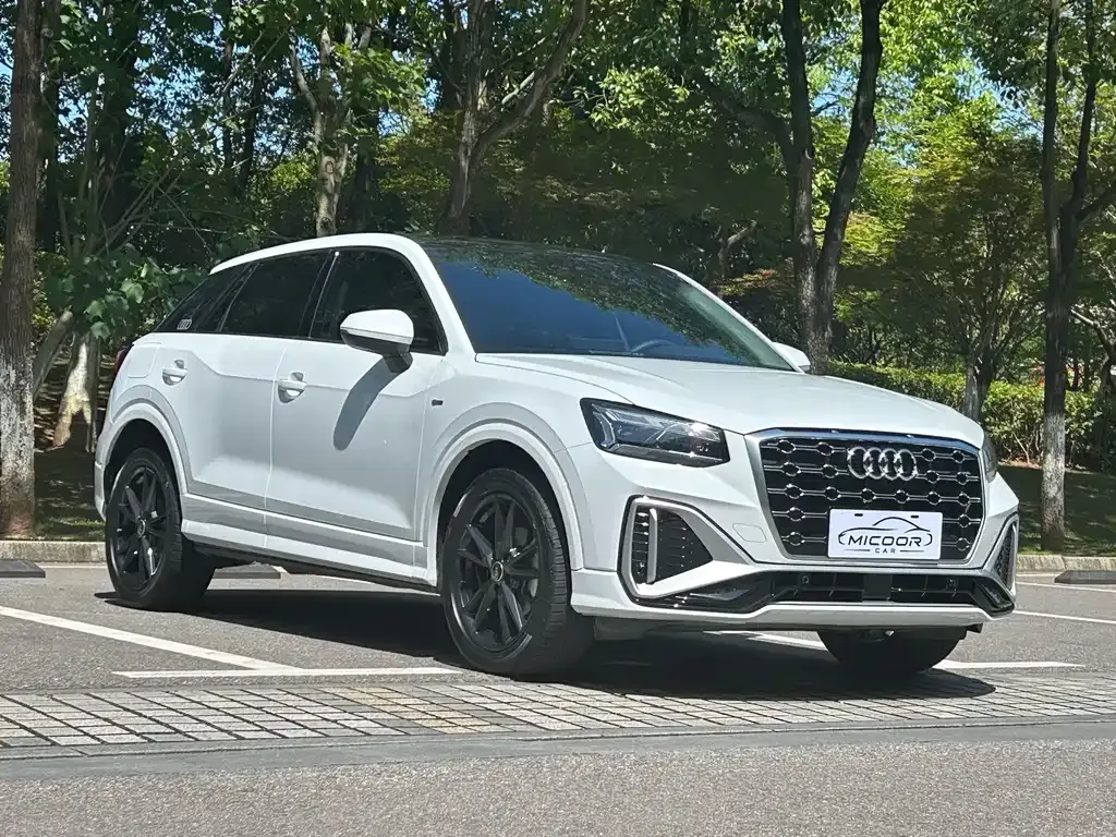 Audi Q2L — фото 10