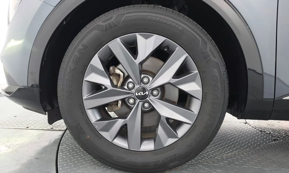 Kia Sportage — фото 10