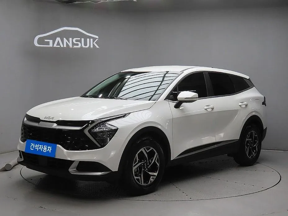 Kia Sportage — фото 1