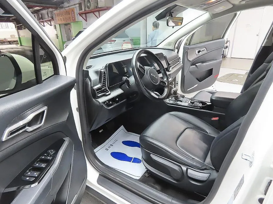 Kia Sportage — фото 10