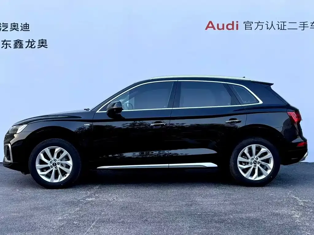 Audi Q5L — фото 9