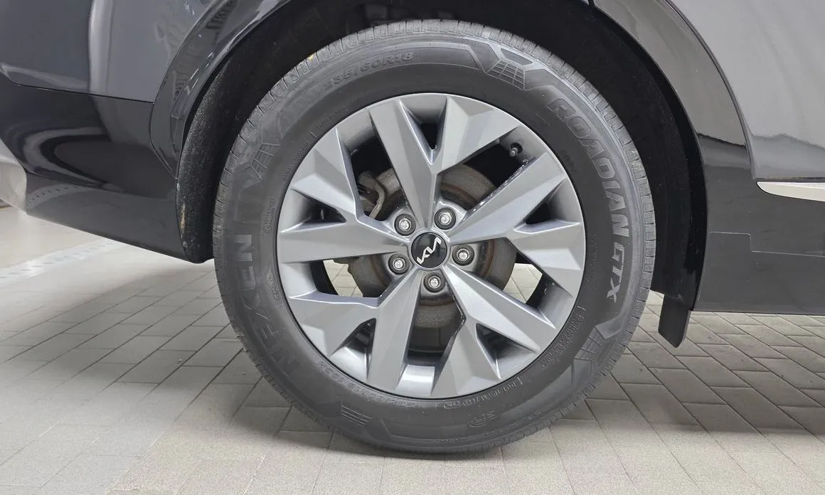 Kia Sportage — фото 9
