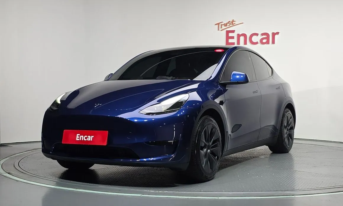 Tesla Model Y — фото 1